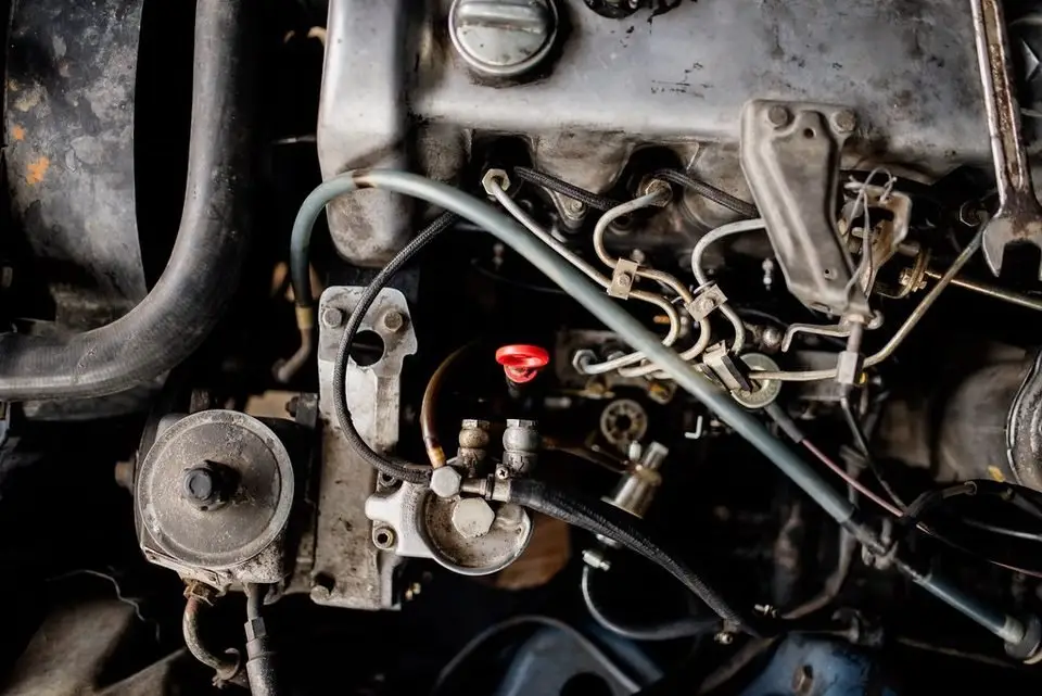 Engine top end where camshaft position sensors are mounted