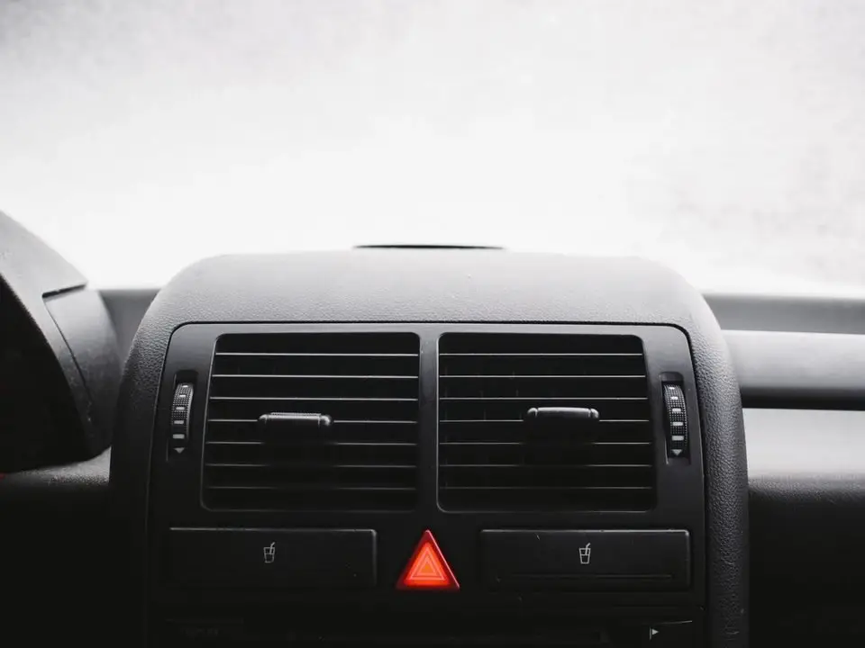 Car dashboard center console; the check engine light can be cleared with an OBD2 scanner
