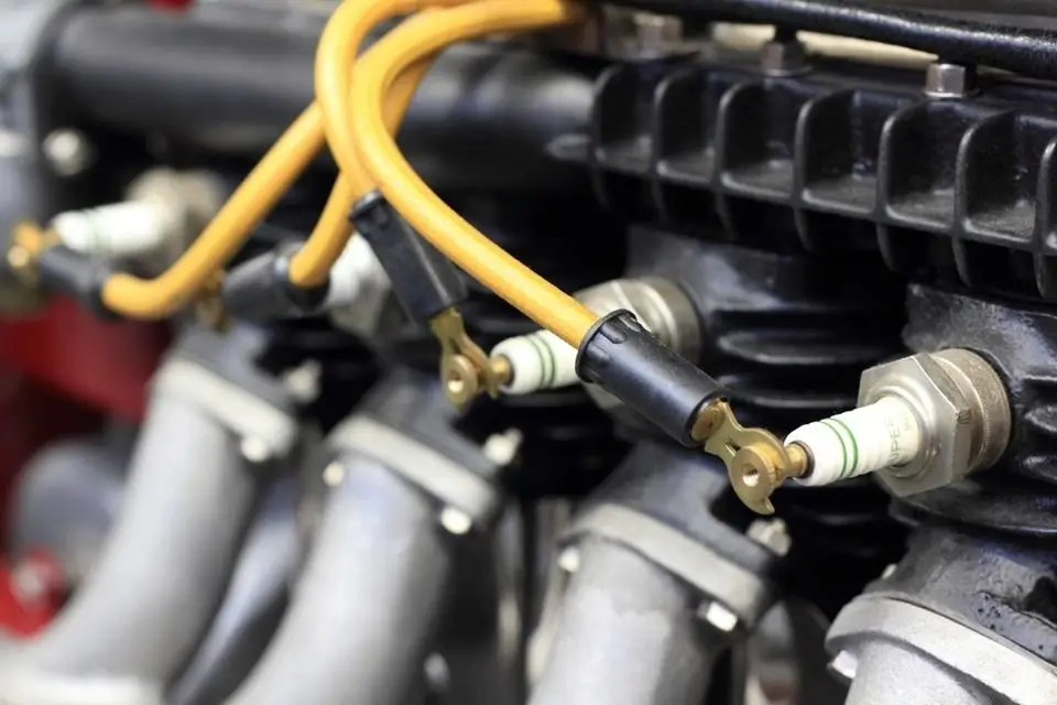 Spark plug wires and plugs on an engine, part of the ignition system along with the ignition coils