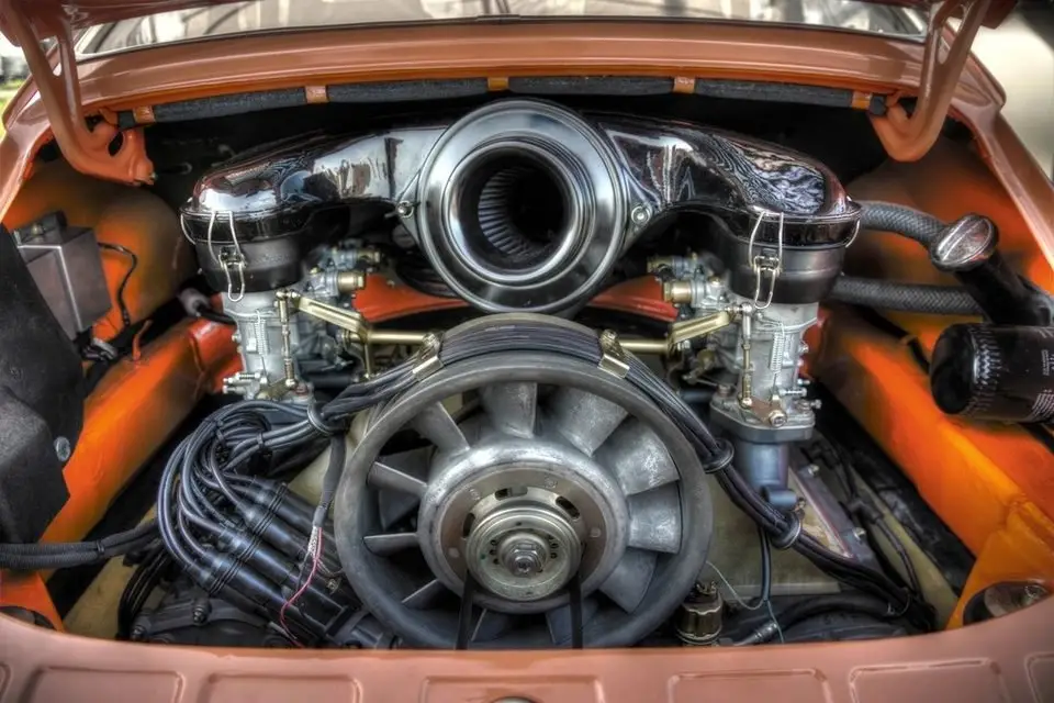 Engine close-up; knock sensors bolt to the engine block, often under the intake