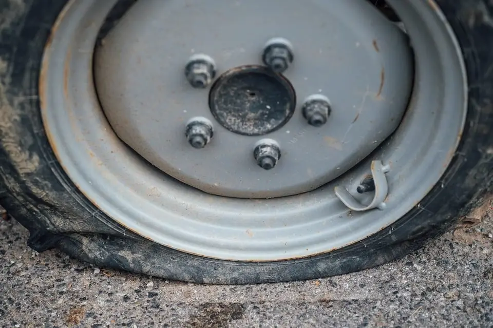 Flat car tire that may be repairable with a plug-patch