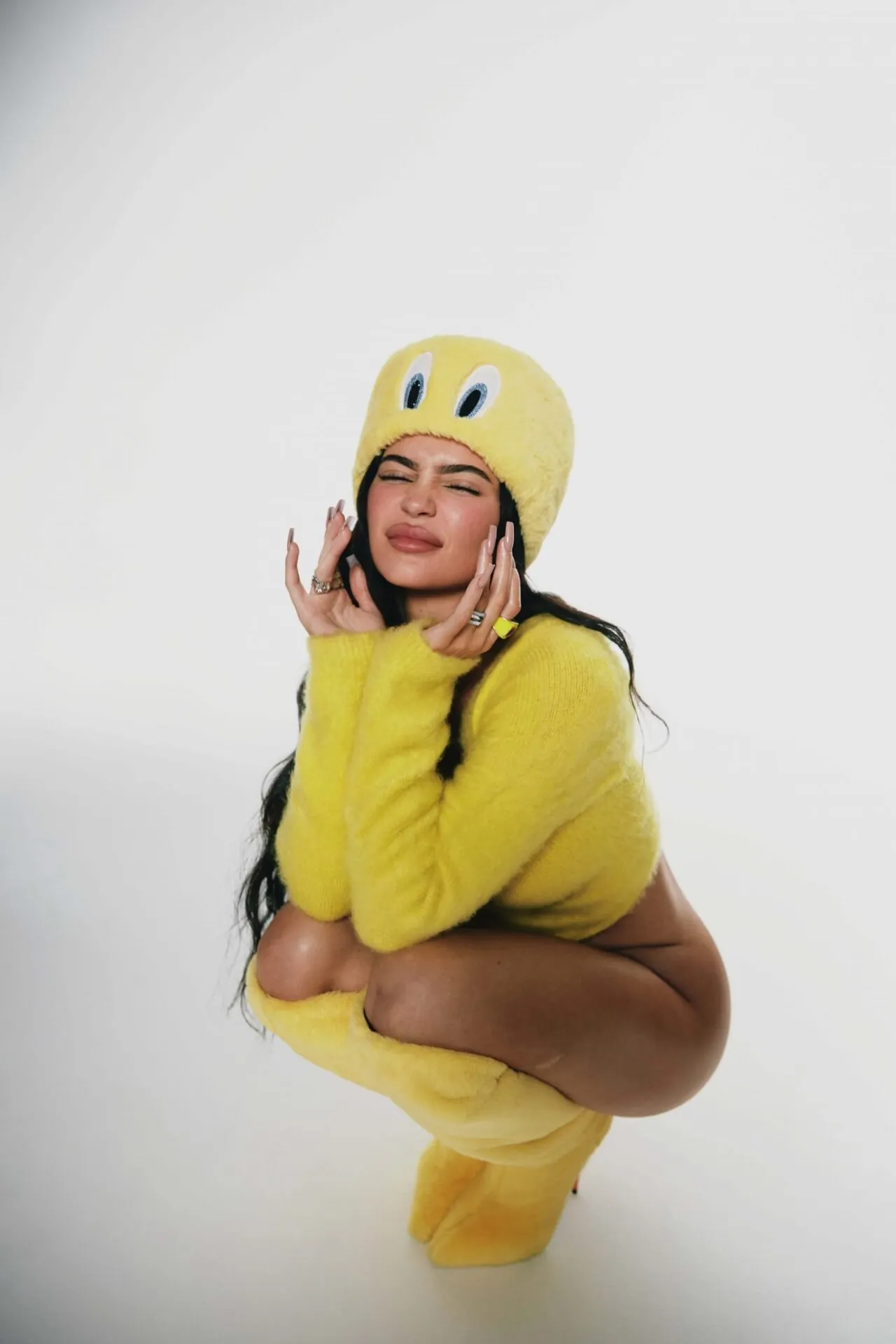 Kylie Jenner highlighting signature fashion and modeling aesthetics