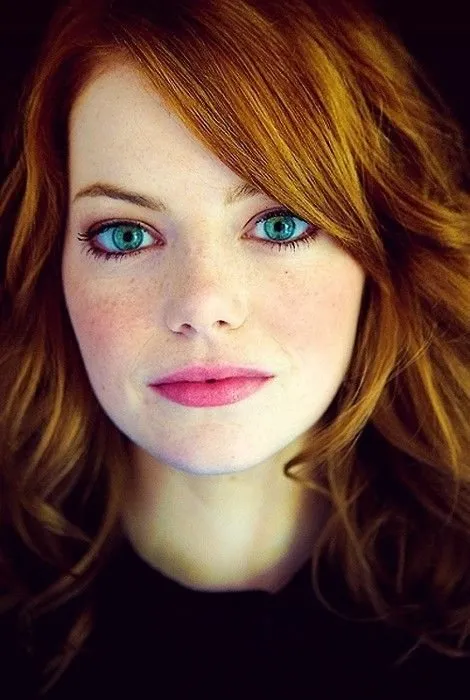 Emma Stone 2026: Bio, Two Academy Awards, $50M Net Worth & Evolution 16 Emma Stone posing naturally for a professional photoshoot