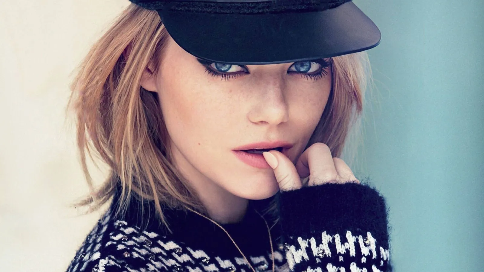 Emma Stone 2026: Bio, Two Academy Awards, $50M Net Worth & Evolution 9 Emma Stone black cap seen from a recent public appearance