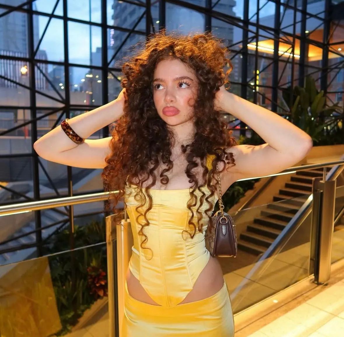 Demitra Kalogeras 2026: From TikTok Dancer to Million-Dollar Brand 9 Demitra Kalogeras posing naturally for a professional photoshoot
