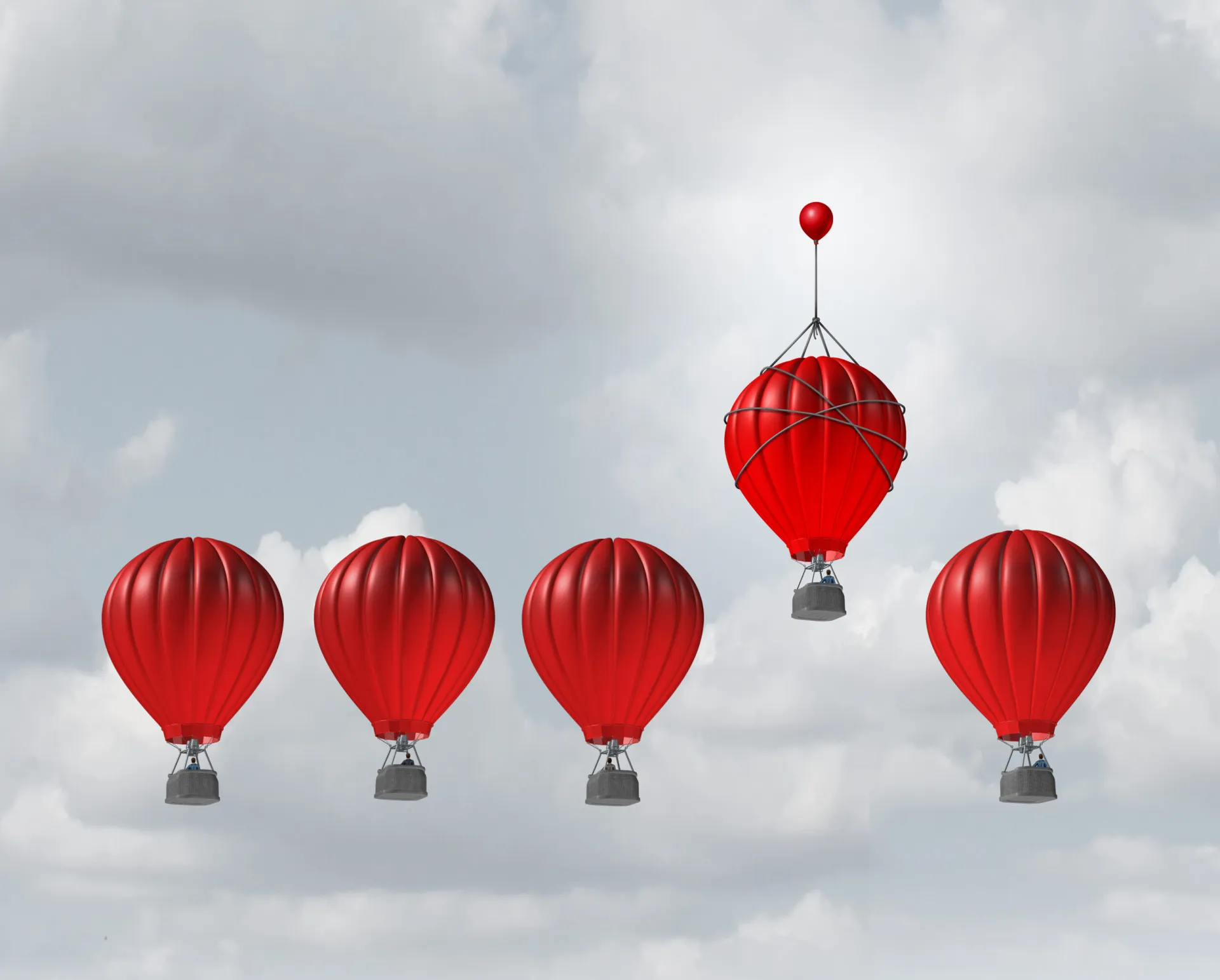 Fünf rote Heißluftballons in einer Reihe, von denen einer durch einen kleinen roten Ballon an der Spitze in die Höhe gehoben wird, symbolisieren Wachstum und Unterstützung - ähnlich wie die systemische Therapie - vor einem wolkenverhangenen Hintergrund.