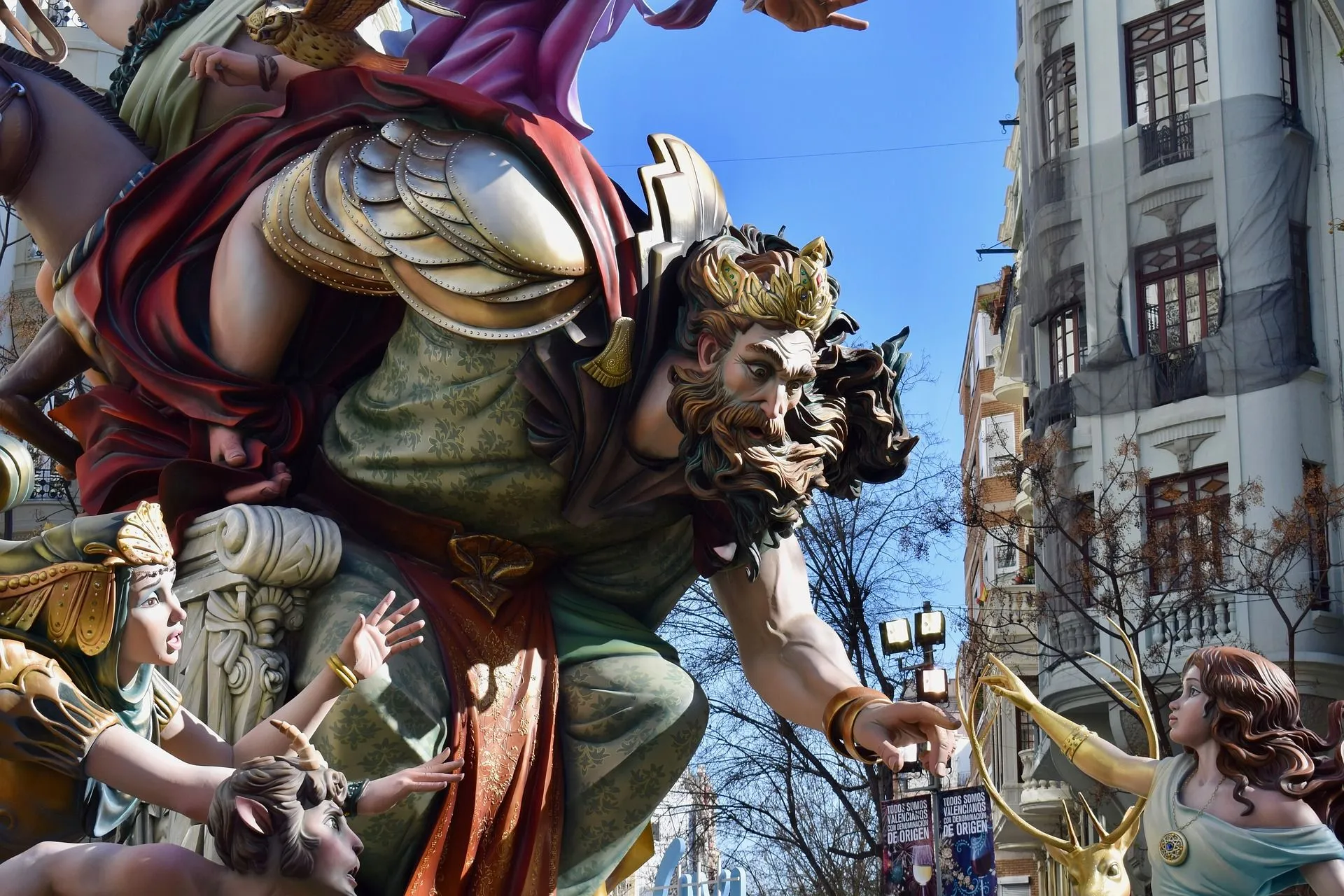 Ninots on Fallas of Valencia, Spain. Ninot is in fact Valencian for doll. It is an individual, free-standing figure, usually in the shape of a popular character or famous person.