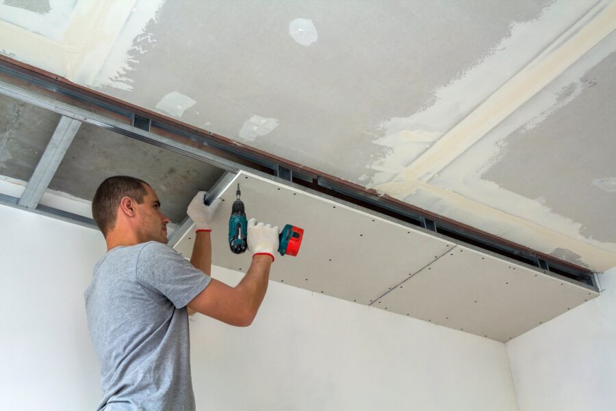Drywall repair and installation by TJ Handyman Services in Orlando, FL – professional handyman fixing drywall ceiling panels for a smooth, durable finish.