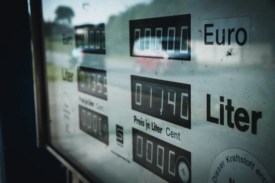 Close-up of a vintage fuel pump display showing zeros in columns for Euro and Liter, with a faded exterior reflection, reminiscent of the precision offered by top Magnetic Drive Pump Manufacturers.