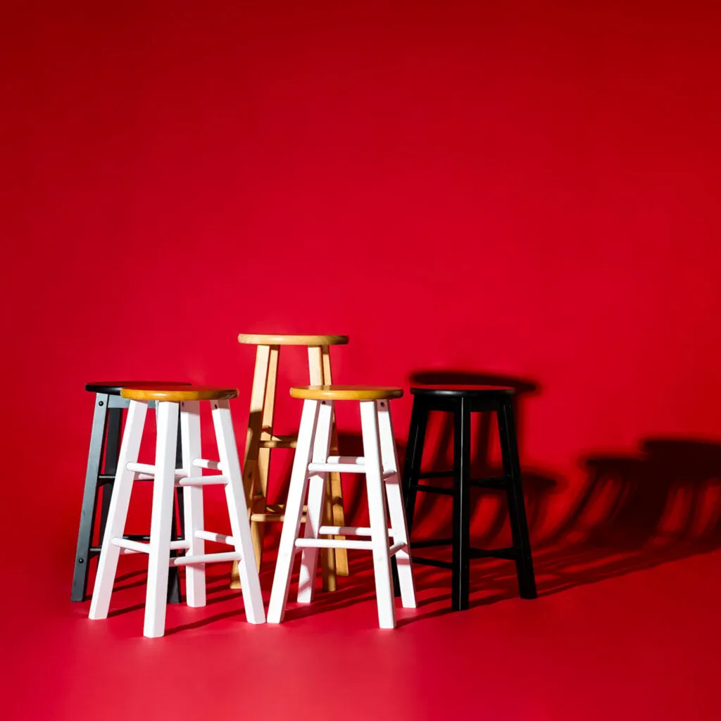 Wooden stools as photography props - black, white, nuetral