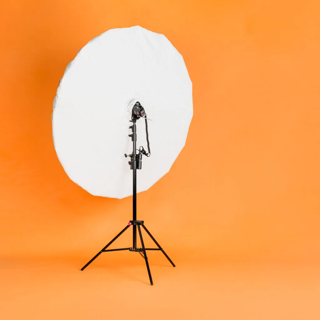 Large 6 ft umbrella modifier with Godox 360W srobe on light stand