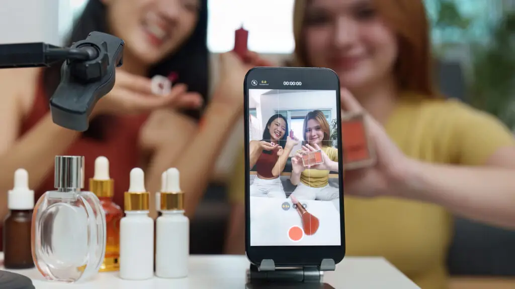 a woman promoting product on phone