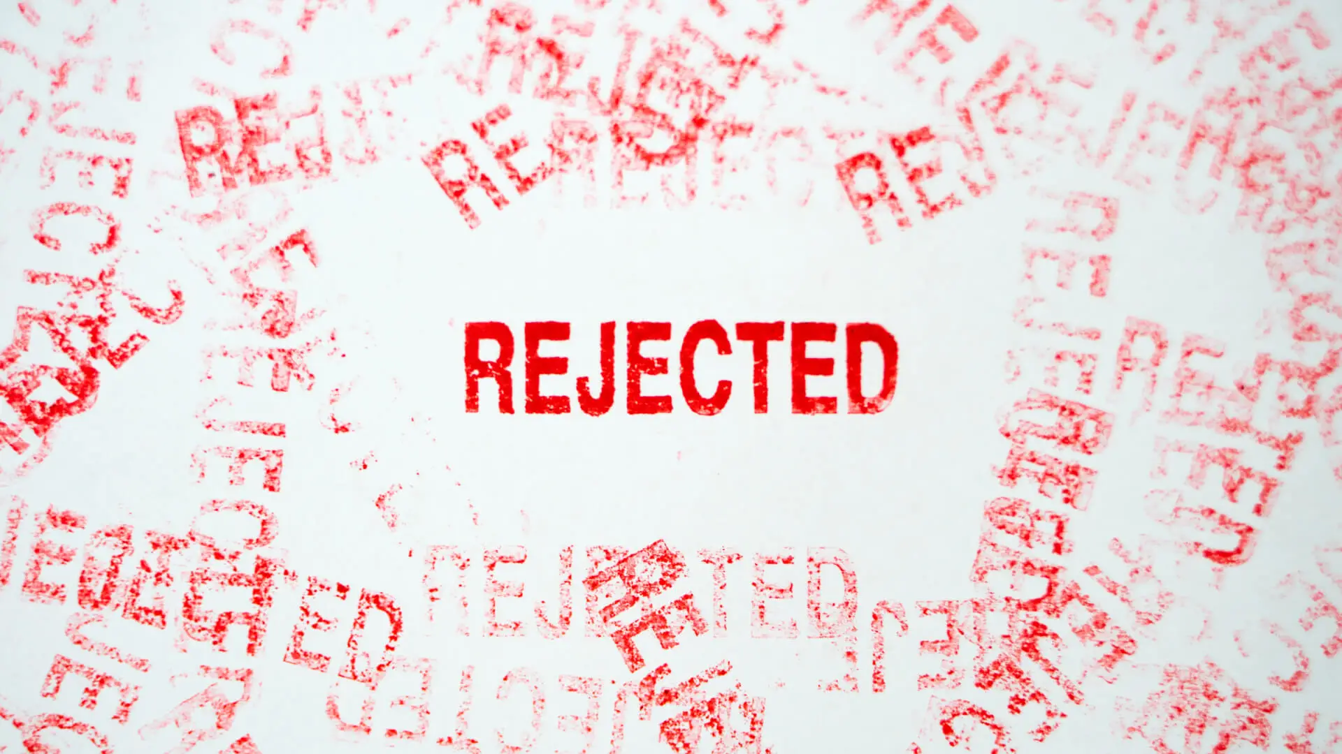 Rejected stamp marks representing refusal or rejection.