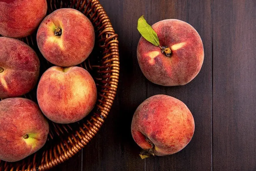 top-view-delicious-juicy-peaches-bucket-wood-Superfoods With Low Calories Why We Love Superfood (And You Should, Too)