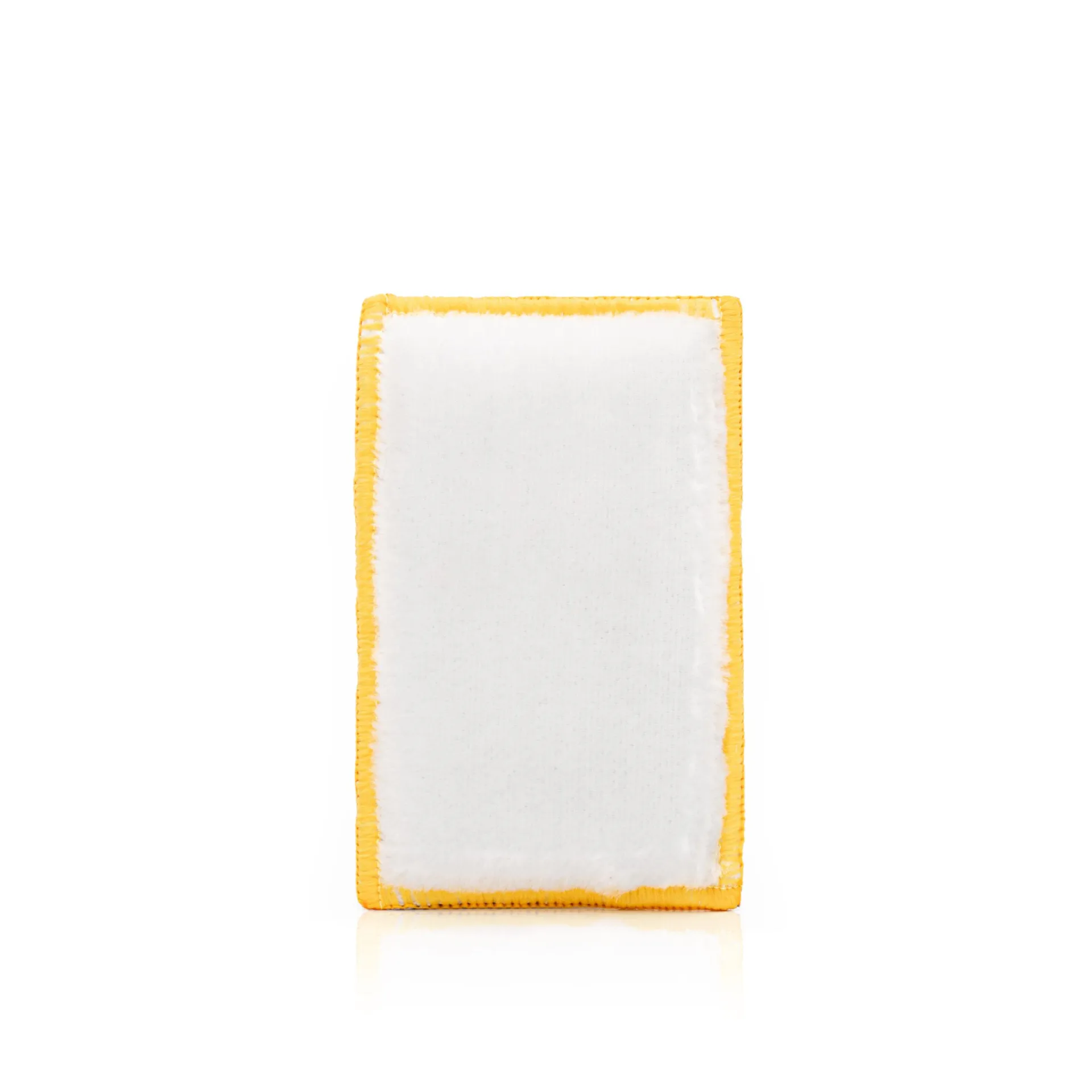 Rectangular white fabric patch with a yellow embroidered border, textured like a microfiber towel, on a white background.