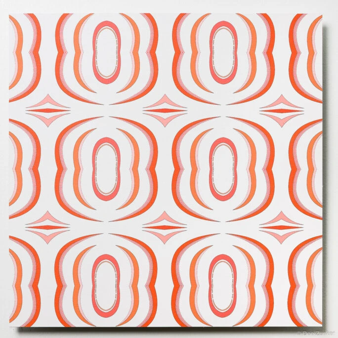Close-up product photo of frosted glass sample featuring repeating orange oval geometric pattern, shot for Houston commercial portfolio.