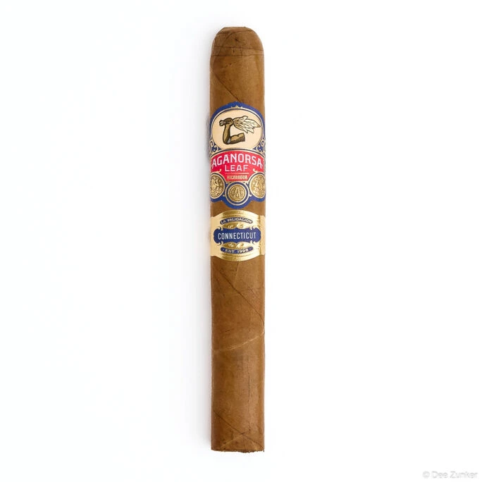 Aganorsa Leaf Connecticut Nicaragua cigar on white background, retail product photography by Dee Zunker Photography Houston TX.