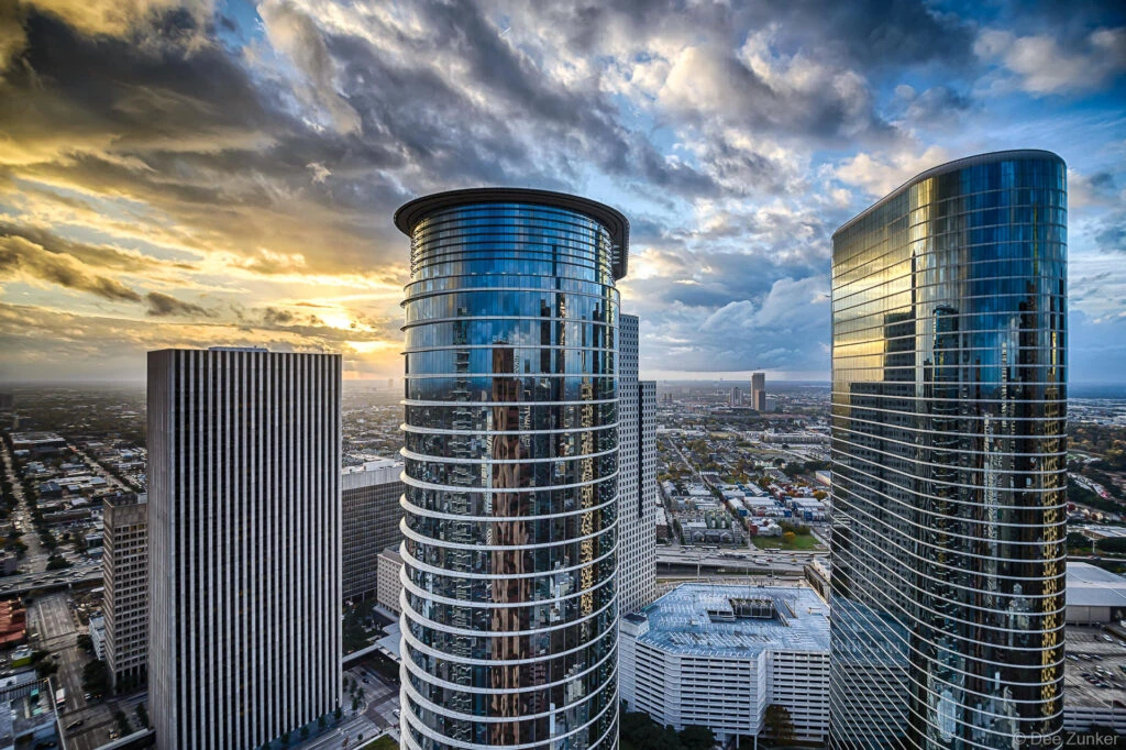 Aerial sunset view from the Wedge International Tower, looking west over Smith Street and the Allen Center, featuring the Chevron buildings (formerly Enron) in downtown Houston.
