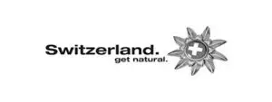 LEE_Suisse Black and white logo: "Switzerland. get natural." with stylized Swiss flag edelweiss for GuestLee luxury rentals in Switzerland. | GuestLee luxury rental Switzerland