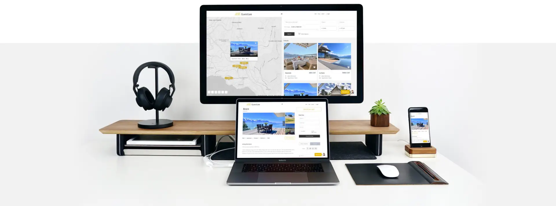 LEE_Rent_Ecran-1 Modern minimalist desk setup displaying GuestLee luxury rental website for properties in Geneva, Verbier, Montreux, Zermatt. | GuestLee luxury rental Switzerland