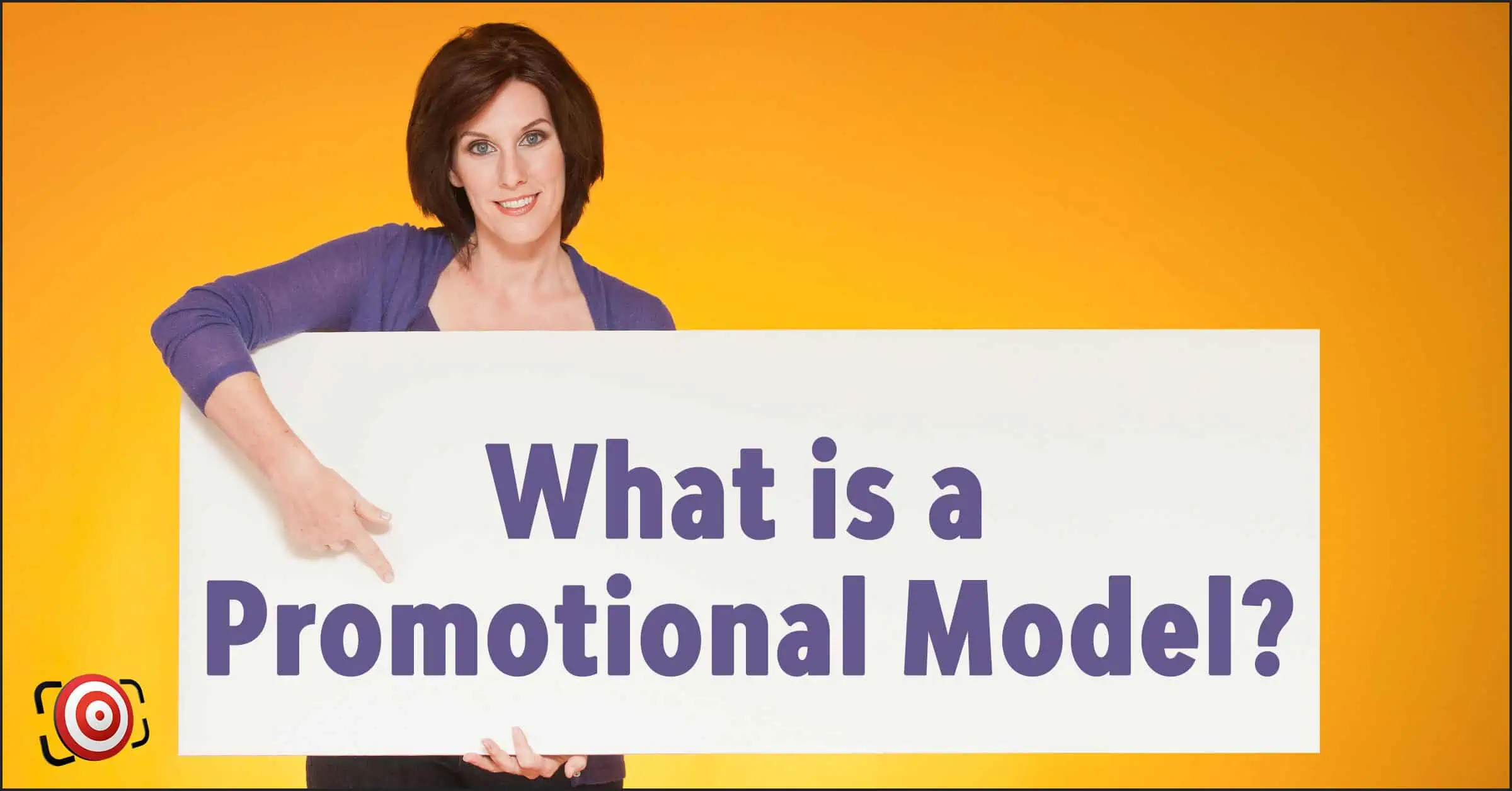 A person stands against an orange backdrop, holding a sign that reads, "What is a Promotional Model?.