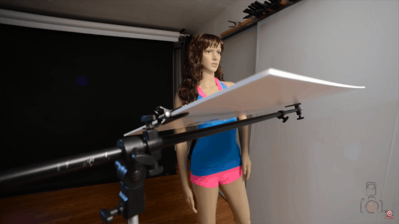 holder with DIY photography reflector