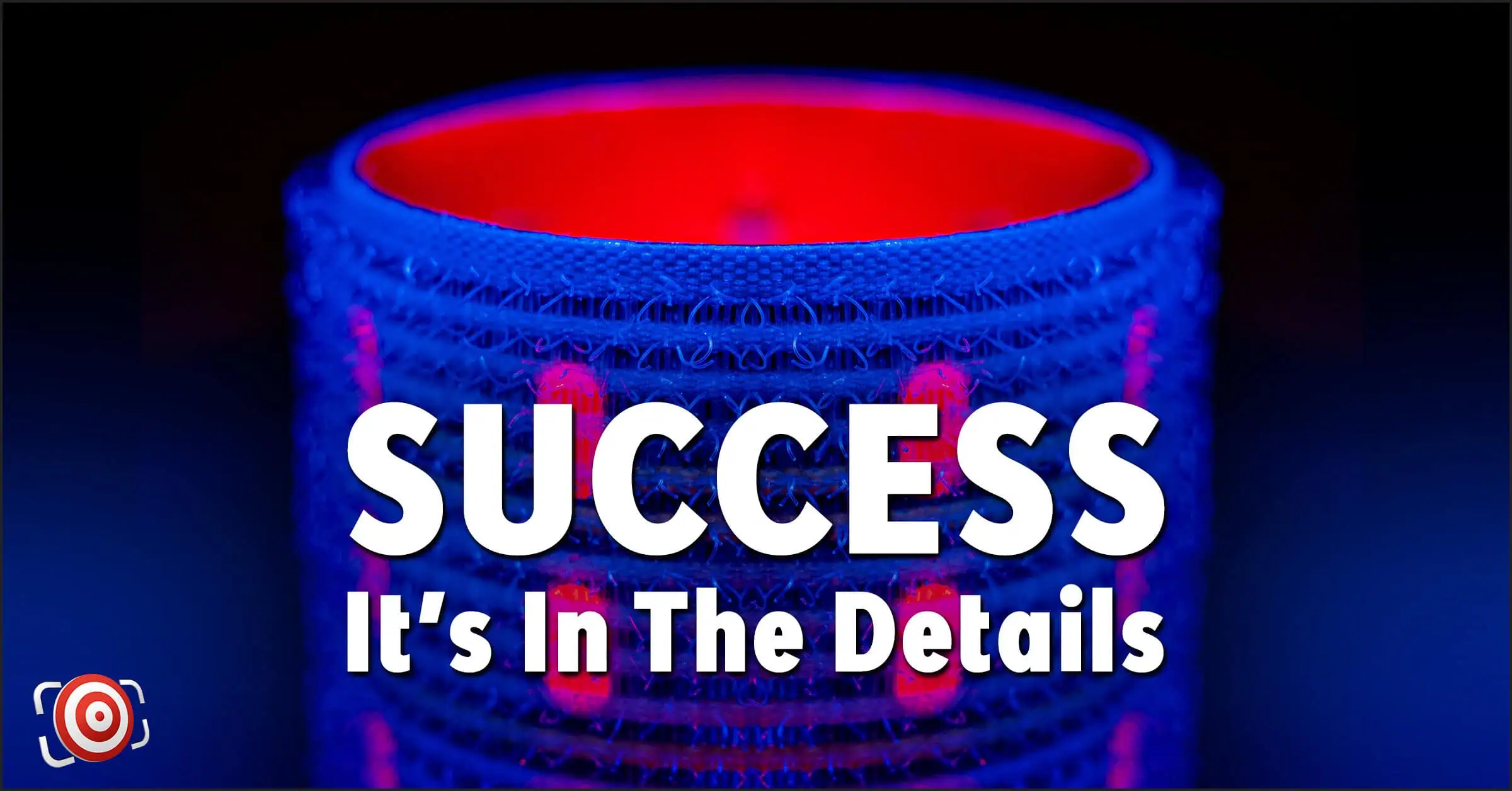 A close-up of a blue textured object with a red interior captures the essence of success in photography. The text overlay reads, "Success as a photographer - it's in the details."