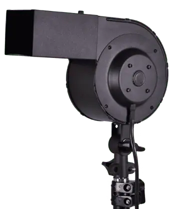A black studio light mounted on a stand, perfect for blowing hair photography, features a round body and a rectangular hood.