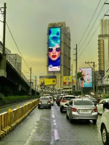 GA Tower in Mandaluyong City with my photo on the side of it.