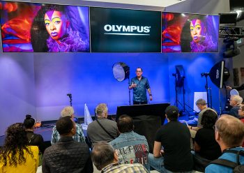 Joe Edelman on stage for Olympus at WPPI