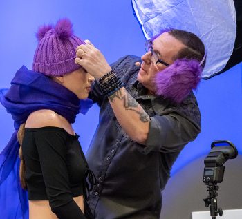 Joe Edelman on stage for Olympus at WPPI