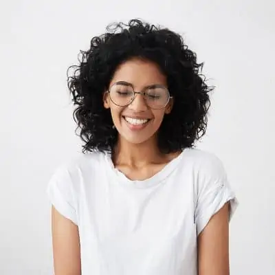 What causes blinking in photographs and a young woman blinking