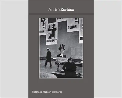 The cover of a book with an image of a man in a top hat by André Kertész.