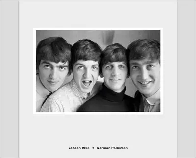 A black and white photo of the beatles.