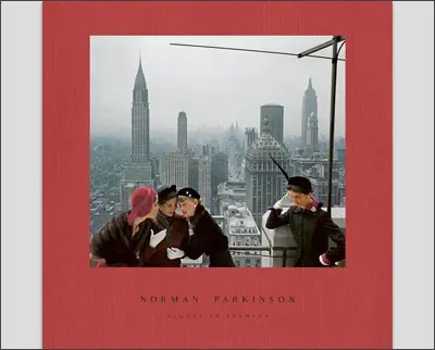 A red cover with a picture of two women on top of a building.
