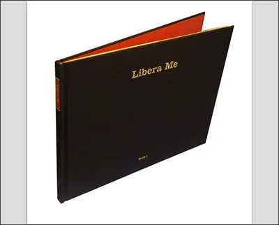 A black book with the words liberate me on it, inspired by Martin Parr.
