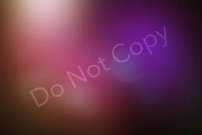 A colorful beauty portrait with the words do not copy displayed against a blurred background.