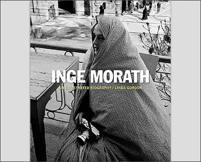 Inge morath a photographic portrait of a woman sitting on a bench.