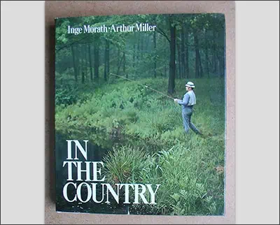 The cover of in the country with a man fishing.