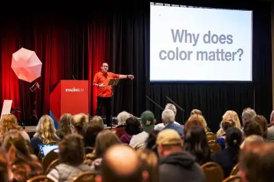 Joe Edelman giving a presentation at ImagingUSA in Nashville, TN, organized by PPA (Professional Photographers of America).