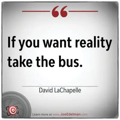 Quote in black text reads, "If you want reality, take the bus," attributed to renowned artist David LaChapelle. The background is white with a red border and features a small target logo in the bottom left corner.