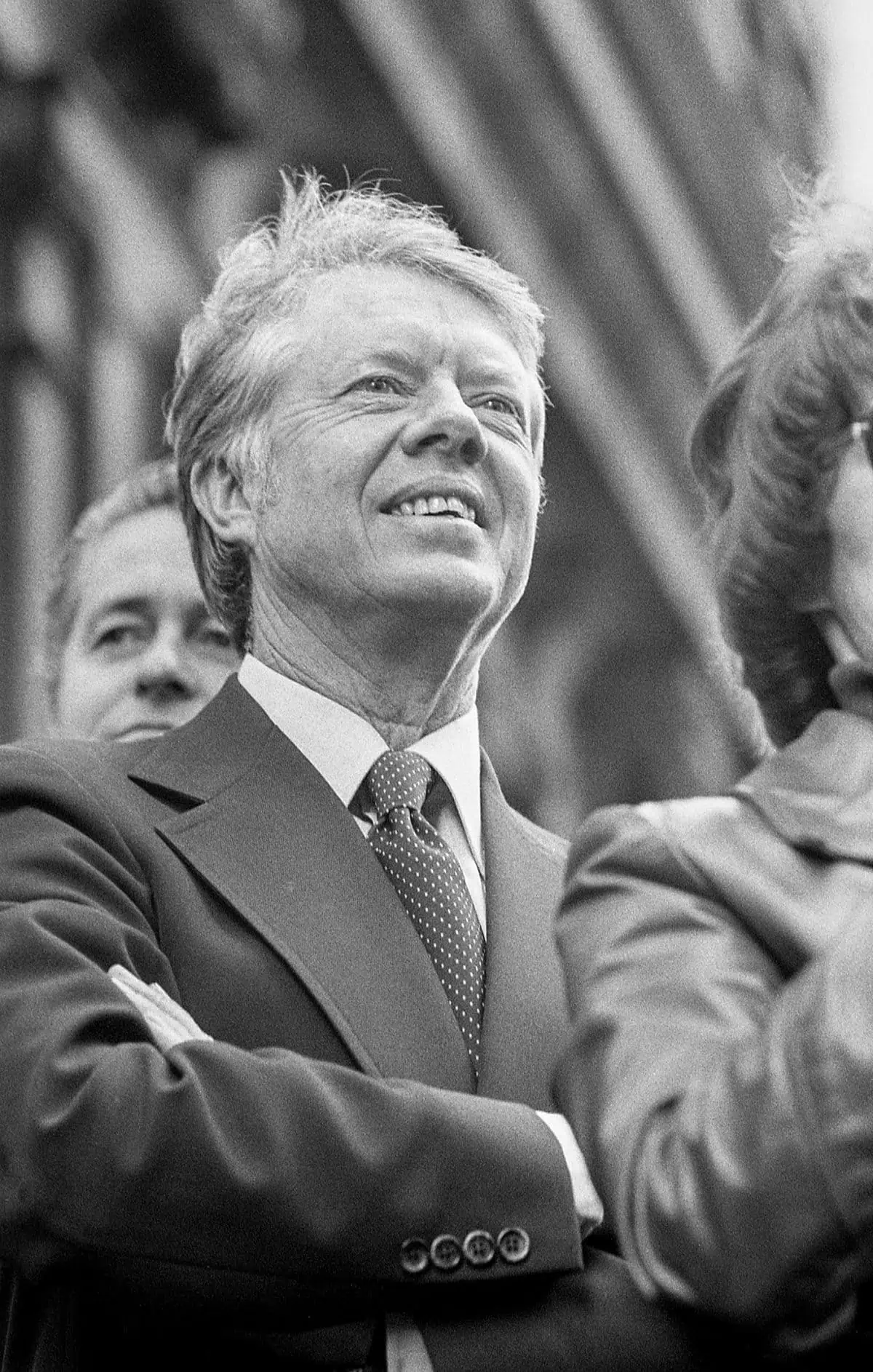 Democratic presidential candidate Jimmy Carter stands on stage surveying the crowd during an outdoor rally at 15th and Chestnut Streets in Philadelphia, PA on October 29th, 1976