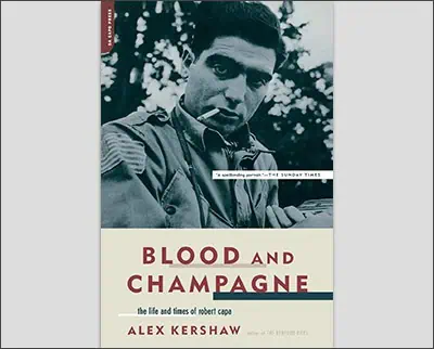Blood And Champagne: The Life And Times Of Robert Capa Paperback – May 26, 2004 by Alex Kershaw (Author)