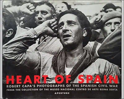 Cover of "Heart of Spain," featuring a legendary black-and-white photo by war photographer Robert Capa of the Spanish Civil War, with text about the collection from Museo Nacional Centro de Arte Reina Sofía.