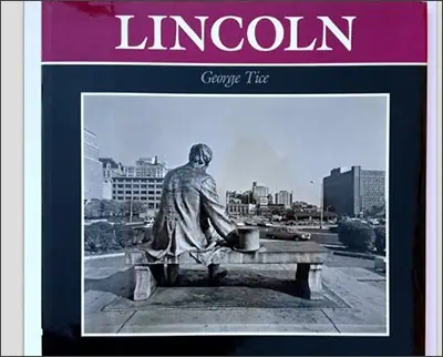 Cover of a book titled "Lincoln" by George Tice, featuring a black and white image of a statue's back view overlooking a cityscape.