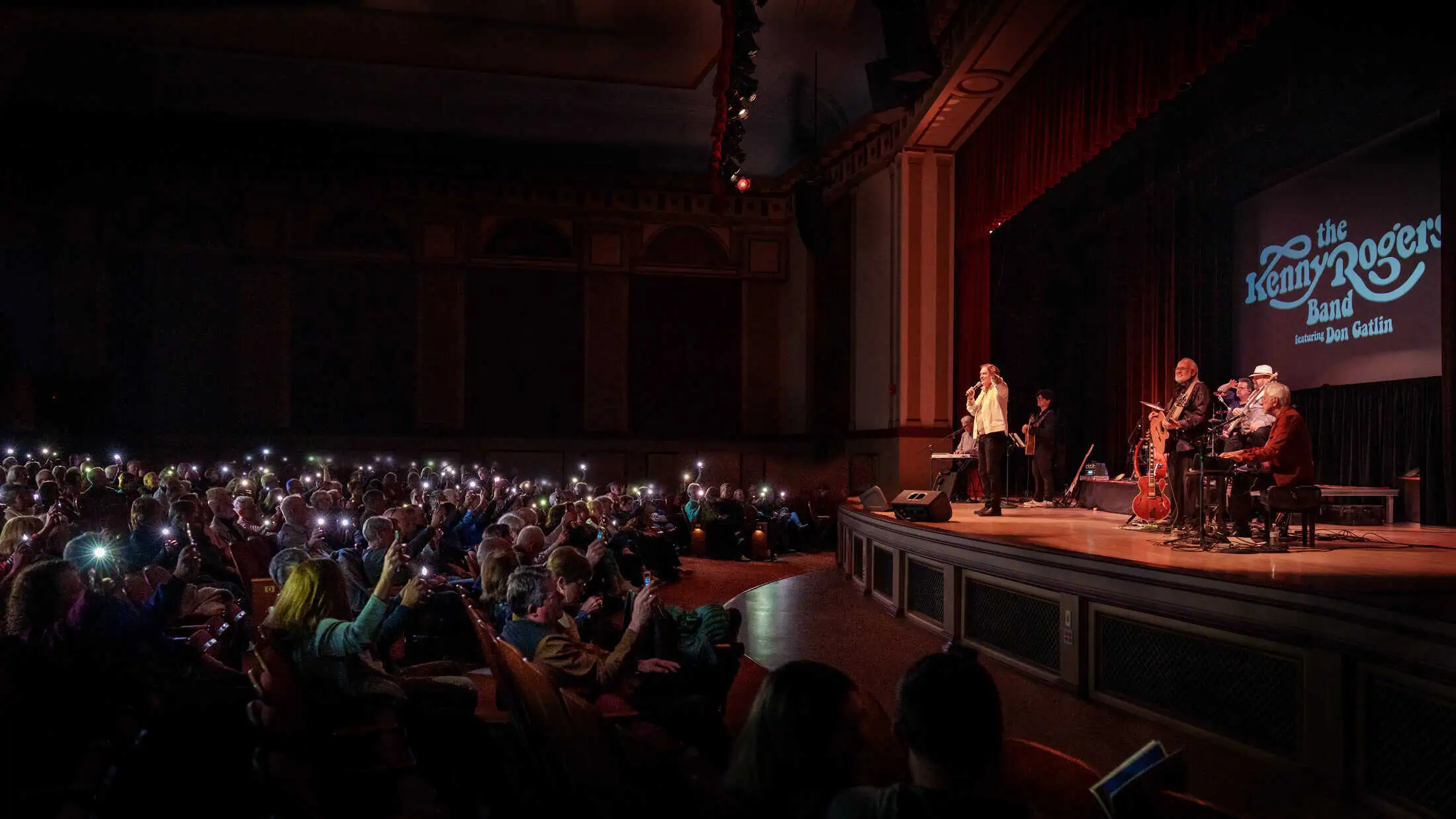The Kenny Rogers Band fronted by Don Gatlin on stage at the Schaeffer Auditorium on the Kutztown University campus in Kutztown, Pennsylvania.