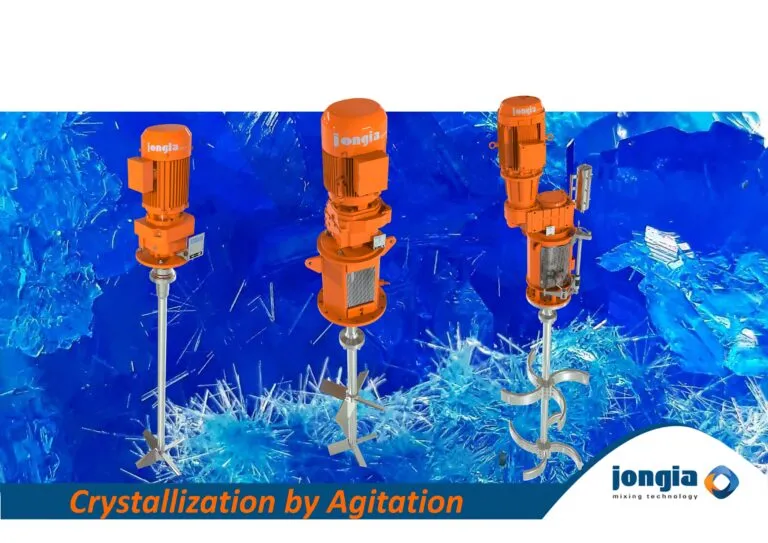 Three orange industrial mixers with metal blades are displayed against a blue background resembling crystallized structures. The text reads Crystallization by Mixing and features the Jongia Mixing Technology logo.
