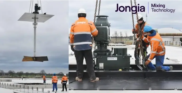 On the left, workers in orange safety jackets guide a large industrial mixer being lifted by a crane. On the right, workers install the equipment on a rooftop next to the “Jongia Mixing Technology” logo. The sky is overcast.