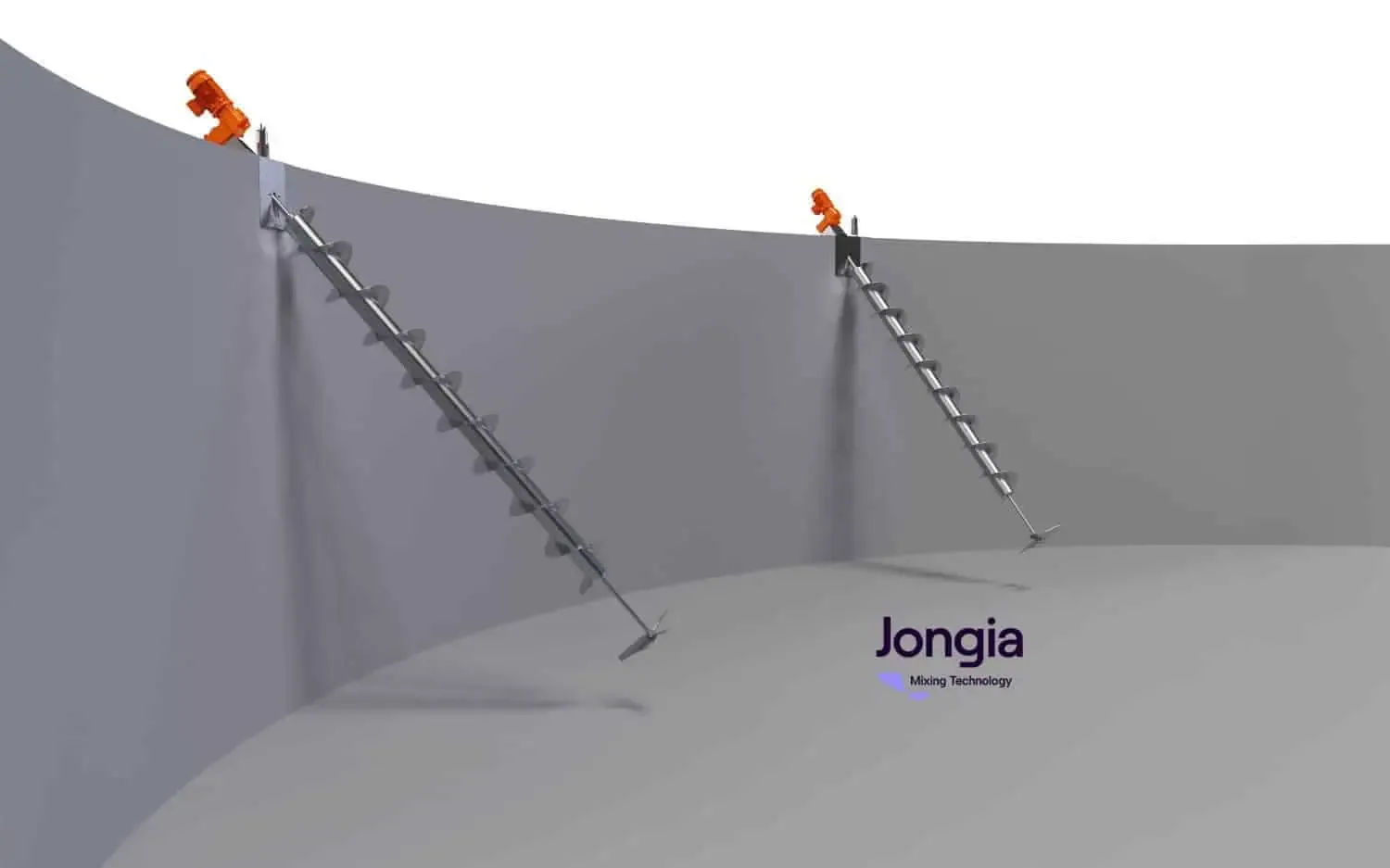 Two metal auger-style mixers are installed diagonally inside a large, upright, gray cylindrical tank. Each mixer is mounted at an angle through the tank’s upper wall, with orange motors attached on top. The tank interior is empty and well-lit.