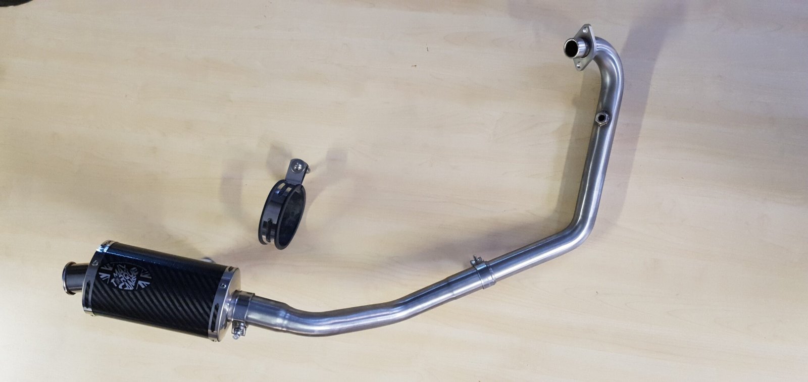 Benelli BN125 Exhaust system and rear silencer by Quill Performance Exhausts UK (1) Benelli BN125 De-Cat Down-Pipe header & Exhaust UK Made benelli bn125 exhaust close-up